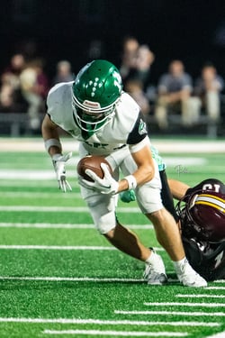 Ball carrier fighting for extra yards